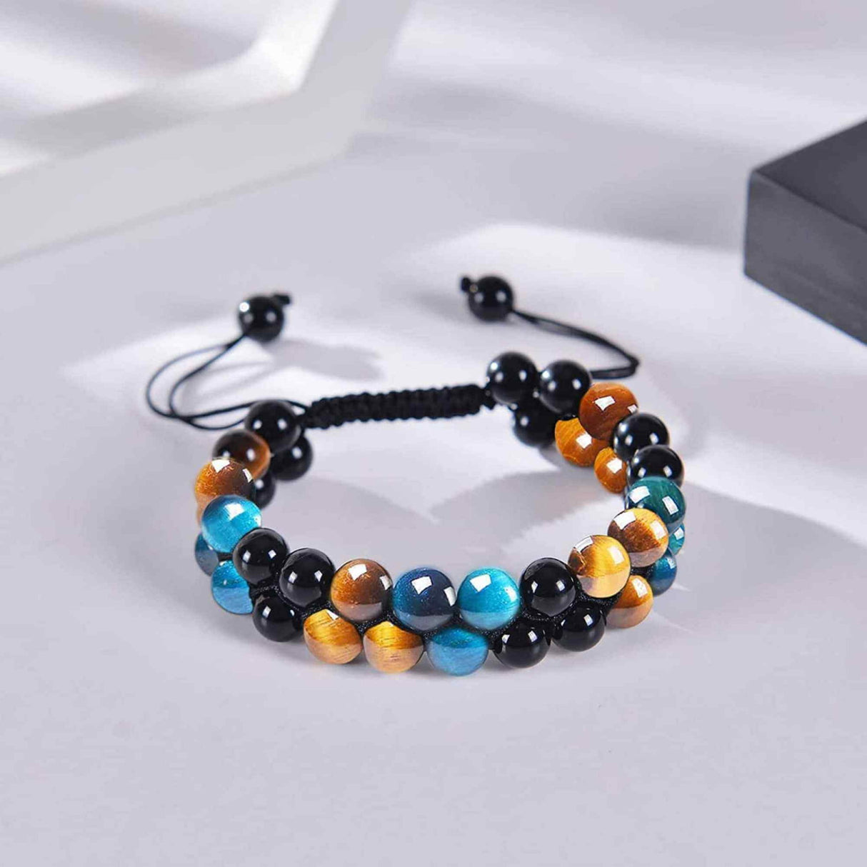 Bratara energetica cu tripla protectie, realizata din pietre semipretioase Obsidian, Ochi de tigru galben si Ochi de tigru albastru de 8 mm - bratara pentru noroc, protectie, stare de bine