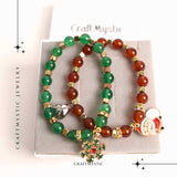 Set bratari cuplu Agat rosu, verde cu accesoriu Mos Craciun si fulg de nea - iubire si protectie
